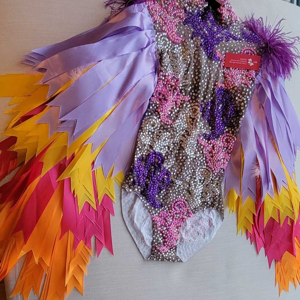 Born in Stockholm Gaga festival bodysuit feathers